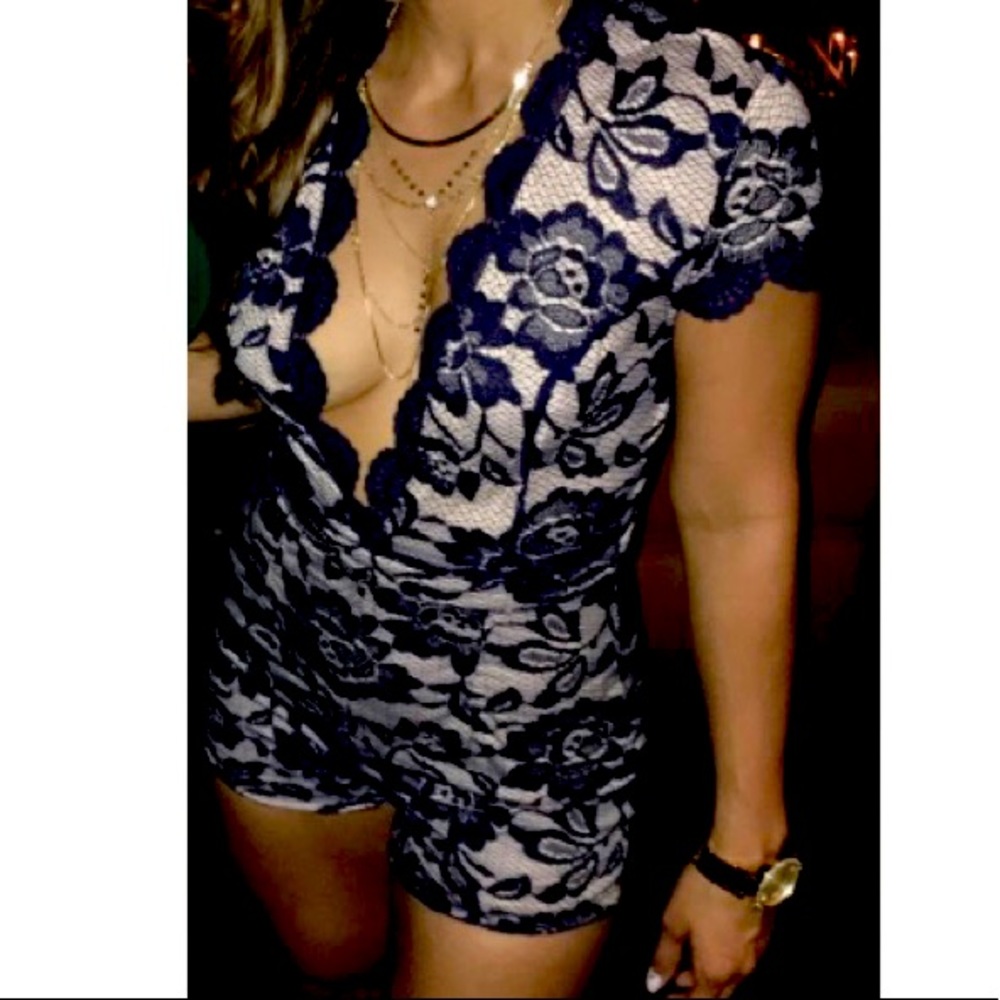Navy blue shorts romper w/plunging neckline